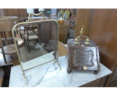An Edward VII mahogany coal scuttle and a Victorian brass mirrored firescreen