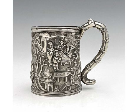 ChinaA late nineteenth or early-twentieth-century Chinese export silver mug, of cylindrical form, the exterior decorated in r