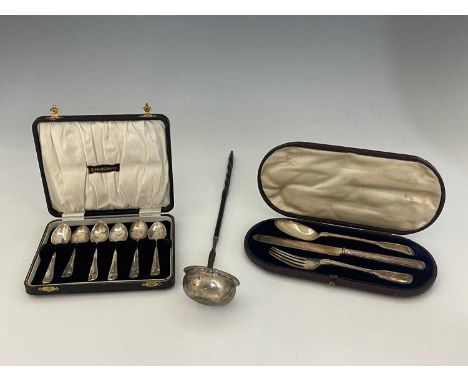 A Victorian silver three-piece Christening set, comprising knife, fork, and spoon, ensuite with a gilt and tooled fitted pres