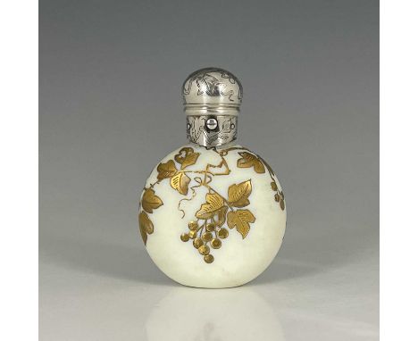 A Victorian silver-mounted scent or perfume bottle, the white opaline or Burmese Queensware glass body decorated in the style