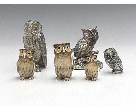 Six silver-coloured metal figures of owls, to include three graduated examples with enamel, and two paperweights, actual silv