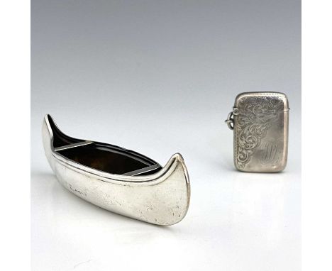 An early twentieth-century novelty silver miniature canoe or kayak, Stokes &amp; Ireland Ltd, Chester c.1910, length 12.7cm, 