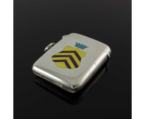 An Edwardian silver and enamel vesta case, of rounded rectangular form, applied in polychrome enamel with, possibly, the arms