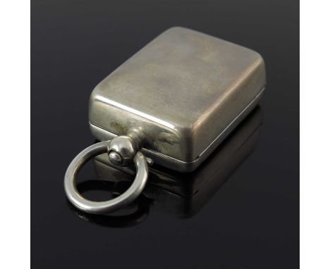 A George V silver combination sovereign holder and stamp case, of rectangular form with push button release, the gilt interio