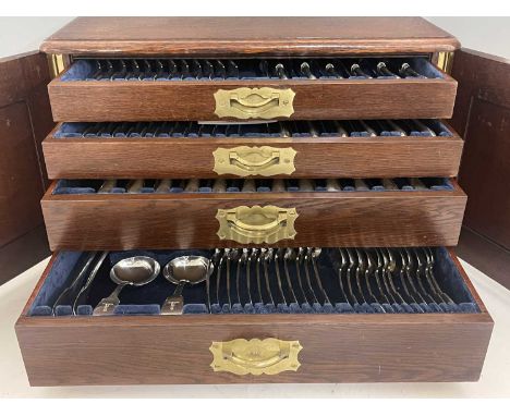 A nineteenth-century English silver composite canteen of flatware, twelve-place setting, the brass-bound fitted case with dua