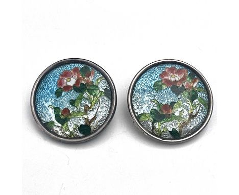 Japan.A pair of late nineteenth of early twentieth-century Japanese silver and enamel Ginbari buttons, each of circular form,