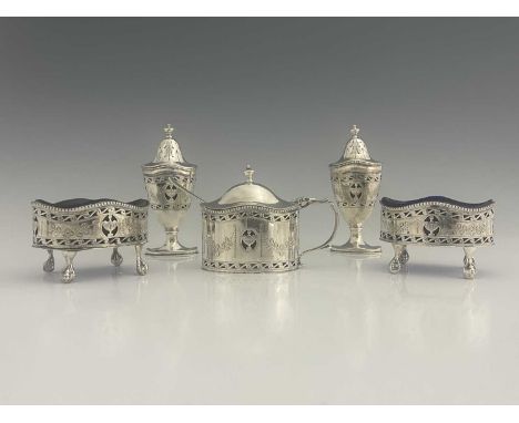 A George V silver five-piece silver condiment set, in the neoclassical style, comprising drum mustard with ladle, two urn for
