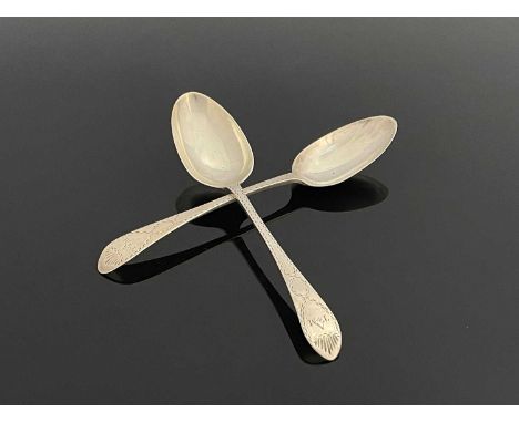 Newcastle.A pair of George III English provincial silver Celtic Point pattern tablespoons, each with feathered edge, initiall