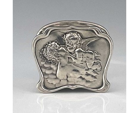 An Edwardian Art Nouveau silver ring box or trinket box, of shaped rectangular form, the hinged cover with repousse decoratio