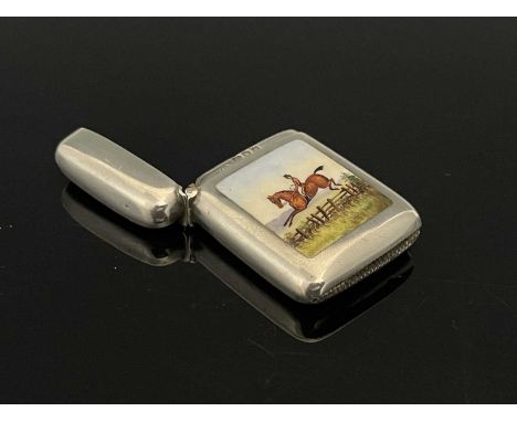 A Victorian silver enamel vesta case, of rounded rectangular form, applied with a polychrome enamel scene of a horse and ride
