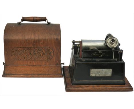 An Edison Gem phonograph, Model A No. G2046, with Gem reproducer, branded lid and original 10-inch conical horn; and a framed