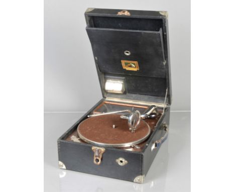 A portable gramophone, HMV Model 101, first front-wind version, with needle bins in lid, 1925-6 (motor runs, case in good con