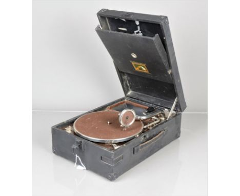 A portable gramophone,  HMV Model C101J, with No 4 soundbox (brass back) (mainspring defective, case fair, some marks on lid)