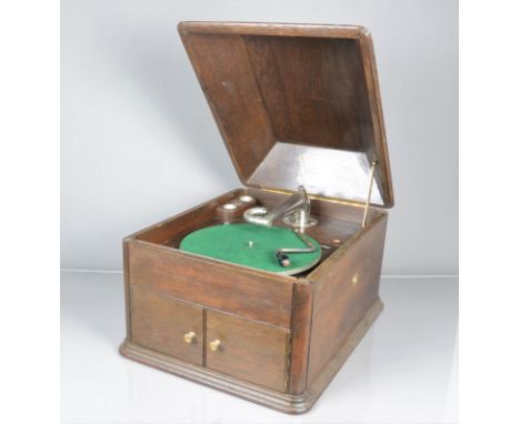 A table grand gramophone, HMV Model 9/120, in dark oak case with 32 motor (runs, no soundbox, extra hole in tone-arm rail)
