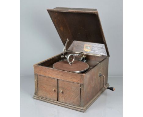 Table grand gramophones, an HMV Model 109, with No 4 sound box, in oak case (motor runs, left-hand side of case delaminating)