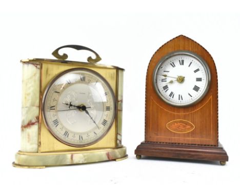 Two vintage 20th century mantle / desk clocks. The lot comprising an Edwardian marquetry inlaid clock featuring shell central