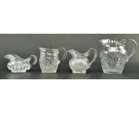 A collection of four early 19th century George IV cut glass sauce boats, cream, milk and water jugs, all with star cut base. 
