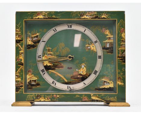 An early 20th century circa 1930s Chinoiserie aesthetic green lacquered mantle clock. The clock rectangular in form with gree