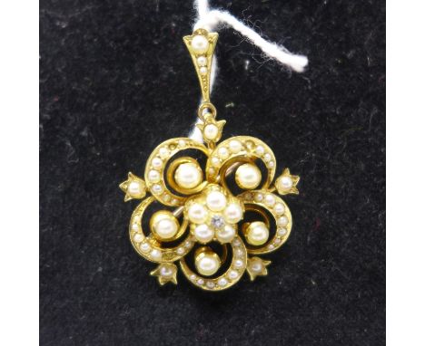 A mid-Victorian, 15ct yellow gold pearl and diamond floral pendant (with brooch fitting) set with a central diamond to a fram
