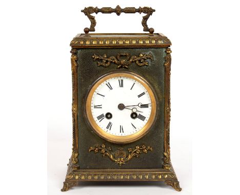 A CONTINENTAL BRASS MOUNTED AND LEATHER COVERED MANTEL CLOCK WITH ENAMEL DIAL AND BREGUET HANDS, STRIKING MOVEMENT, 22CM H EX