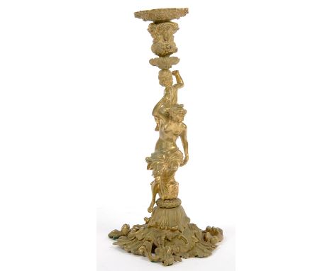 A FRENCH GILT BRASS FIGURAL CANDLESTICK, 19TH C, 37CM H 