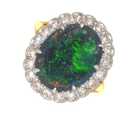 A BLACK OPAL AND DIAMOND RING, IN 18CT GOLD, BIRMINGHAM 1989, 5.5G, SIZE M 