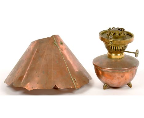 A VICTORIAN COPPER AND BRASS OIL LAMP AND SHADE IN THE MANNER OF W. A. S. BENSON, 23CM D 