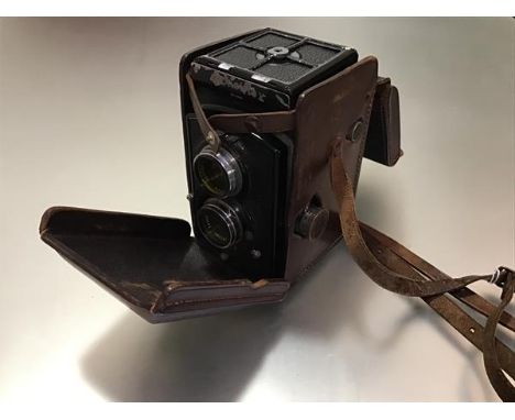 A Rolleiflex Standard K2 6x6 camera, cased.