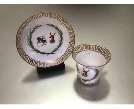 A Chamberlain's Worcester armorial cup and saucer, c. 1815/20, Baden shape, the coat of arms with stag and mounted female war