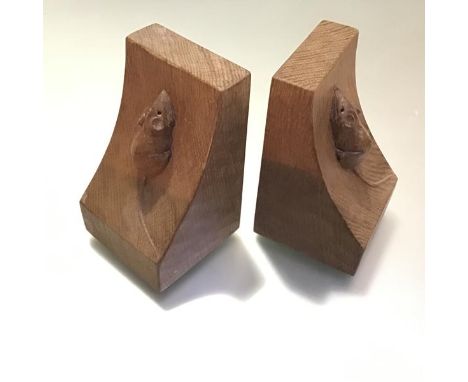 Robert Thompson of Kilburn, a pair of Mouseman adzed oak bookends, with carved mouse signatures. Height 15.5cm