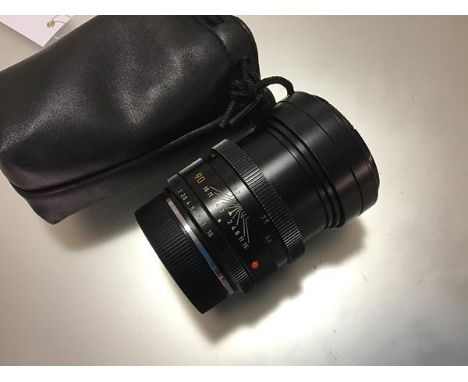 A Leica 90mm F2 Summicron-R lens,  in a soft carry case
