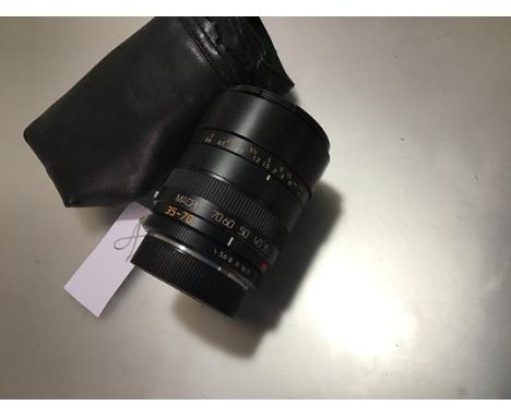 A Leica 35-70mm Vario Elmar-R F4 Macro lens, in a soft carry case