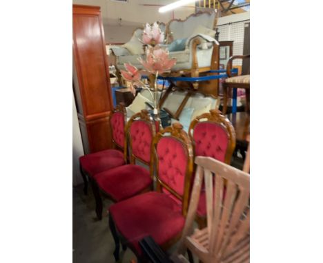 A set of four modern upholstered dining chairs together with a standard lamp with floral shades