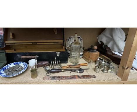 A carpenters tool box together with a plane, other tools, coffee grinder, coins, gladiator, plates etc