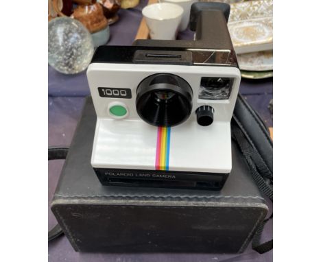 A Polaroid 1000 Land camera