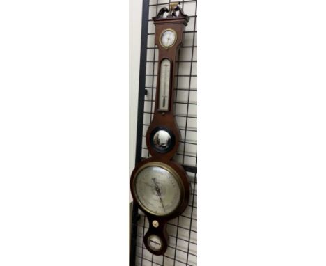 A 19th century mahogany banjo barometer, with a broken swan neck pediment, hydrometer, alcohol thermometer, convex mirror, si