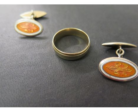 An 18 ct gold band ring - Size V - Weight approx. 5 grm and a pair of silver gilt enamel cufflink's 