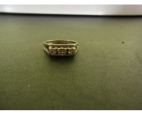 An 18ct gold diamond three-stone ring - Hallmarked Birmingham - Ring size O 1/2 - Weight approx 5.1gms
Condition Report: Good