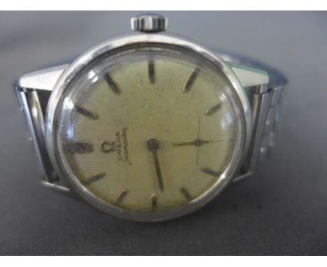 An Omega Seamaster manual wind stainless steel wristwatch - Width 3.7 cm
Condition report:  With a replacement strap, one han