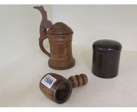 Three pieces of Treen - nutcracker, Lignum vitae boy and a Scandinavian tankard