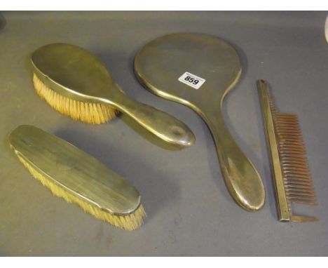 A hallmarked silver dressing table set and a silver backed brush - Total approx. weight 20 troy oz
Condition report:  Damage 