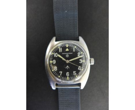 A Hamilton Military mechanical wristwatch in steel case stamped for 1975 - Army issued, case stamped W10-6645-99 523-8290 677