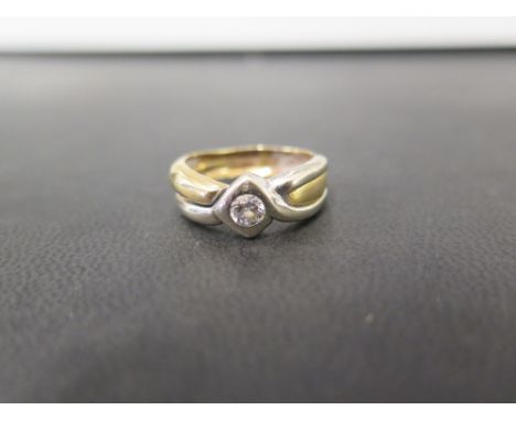 An 18ct bi-colour gold diamond twist ring - Hallmarked Sheffield - Ring size N 1/2 - Weight approx 5.4gms
Condition Report: G