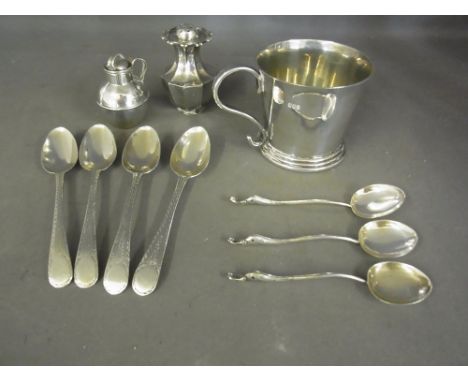 An Irish silver cup 1974 - maker R 11 - Weight approx. 4.5 troy oz - dents to base - four silver teaspoons, three silver swan