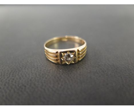 An early 20th century 18ct gold old-cut diamond band ring - Ring size P - Weight approx 3.4gms
Condition Report: Good - With 