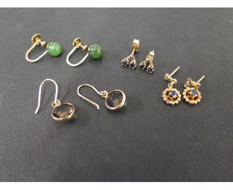 Four pairs of gem-set earrings - To include sapphire, quartz and nephrite jade - Three with marks indicating 9ct gold - Total