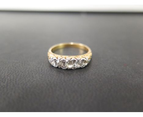 An early 20th century 18ct gold old-cut diamond five-stone ring - Estimated total diamond weight 0.75ct - Ring size P - Weigh