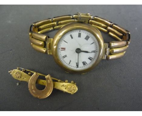 A ladies 9 ct gold cased wristwatch and 9 ct expanding bracket - no working, cracks to  dial along with a along with a 9 ct g
