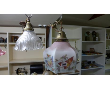 A holophane ceiling lamp - Height 20 cm x Width 17cm and a butterfly decorated hanging lamp - Height 28 cm x Width 23cm 
Cond