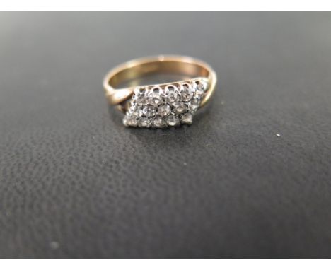 An early 20th century 18ct gold diamond panel ring - Set throughout with old-cut diamonds - Ring size S - Weight approx 4.0gm